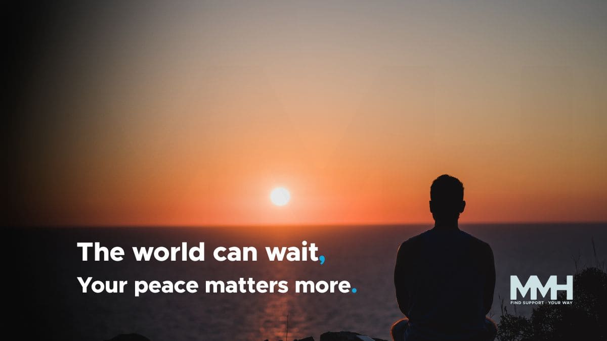 Silhouette of a man meditating at sunset by the ocean, reflecting on regaining balance and mental calm from life stress.