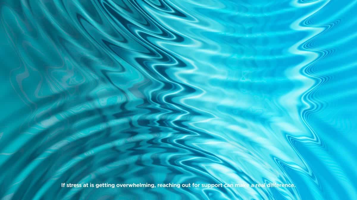 Ripple effect on turquoise water, illustrating how stress can distort mental clarity and affect emotions and behaviour.