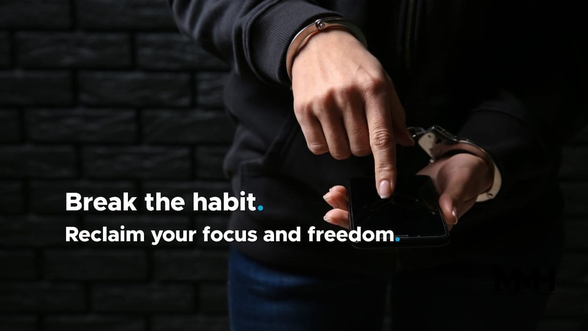 Close-up of a man in handcuffs scrolling on a smartphone, with the message "Break the habit. Reclaim your focus and freedom."