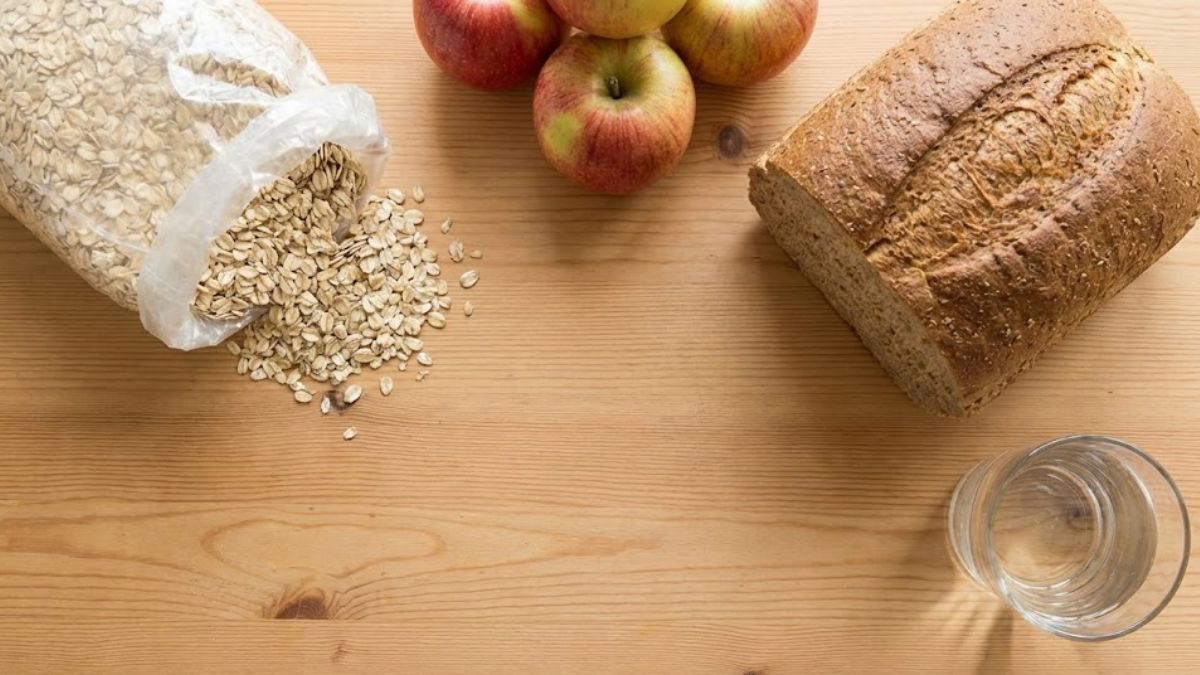 Raw healthy ingredients laid out on a wooden table representing fuel for the brain.