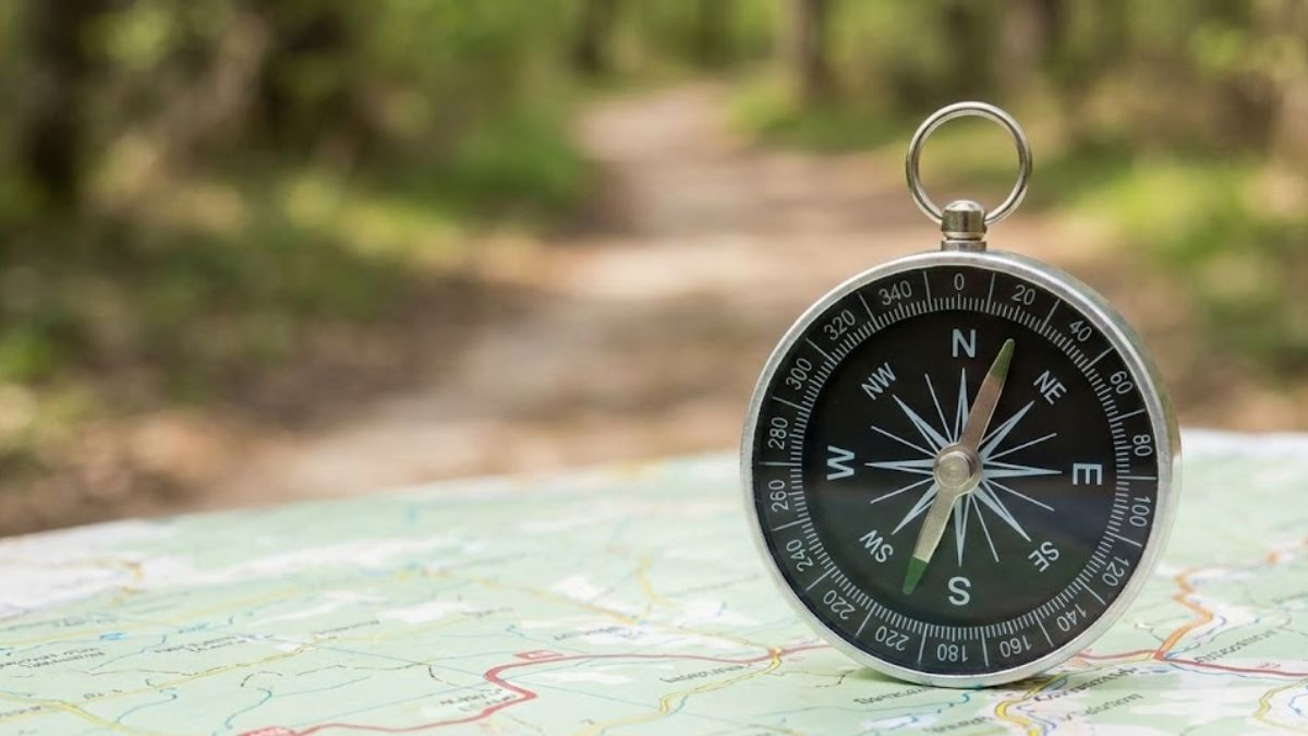 Navigating Relationship Issues A compass on a map representing the guidance provided by therapy.