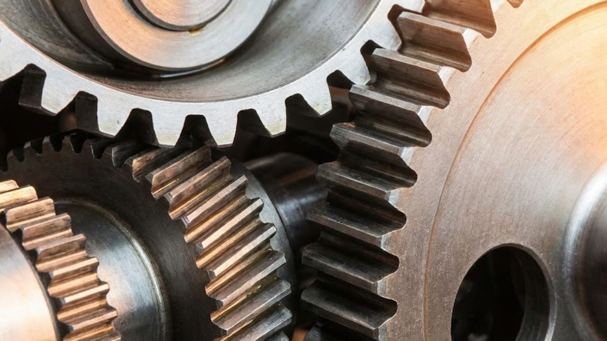 Interlocking gears representing how social support drives mental health function.